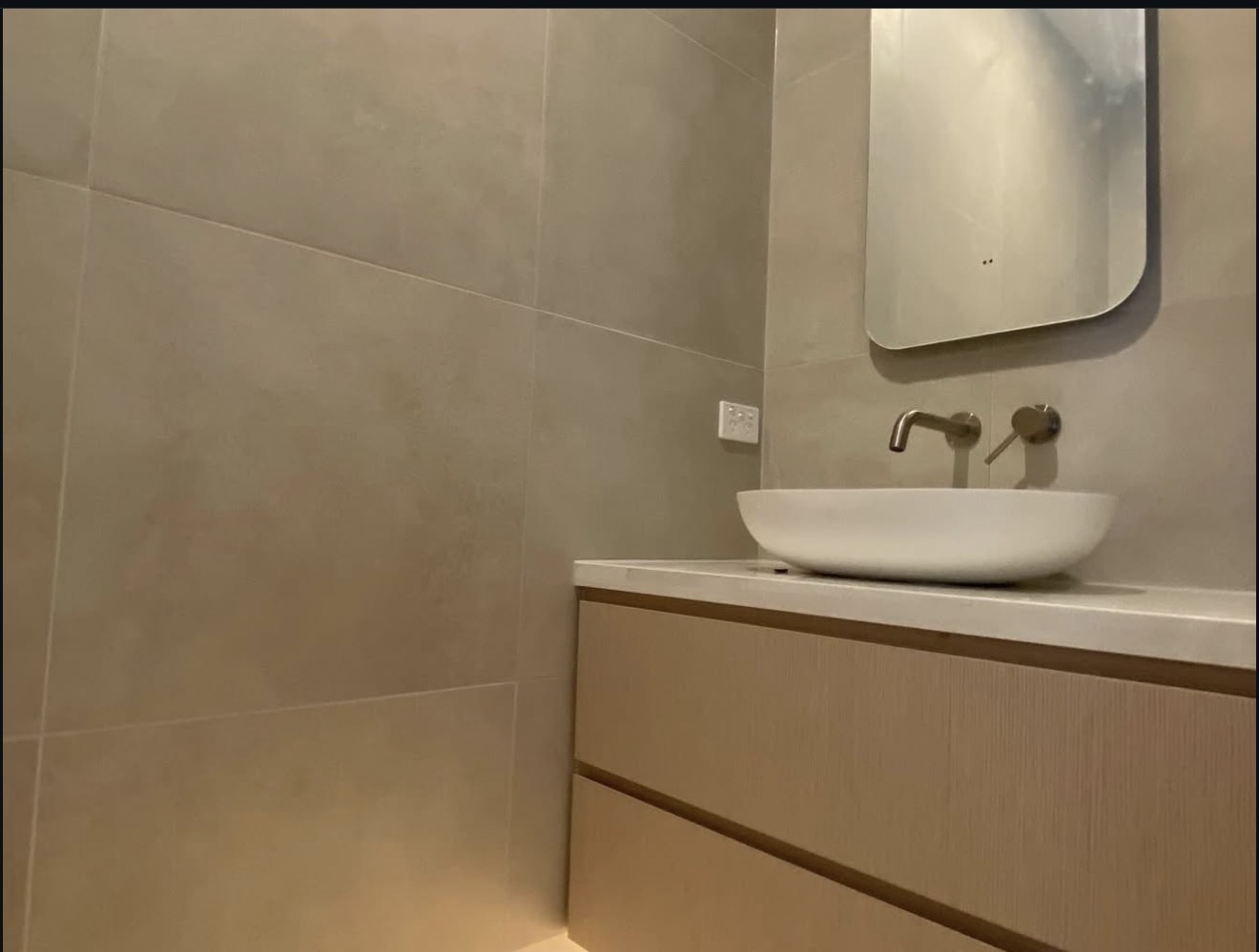 Bathroom vanity with vessel basin